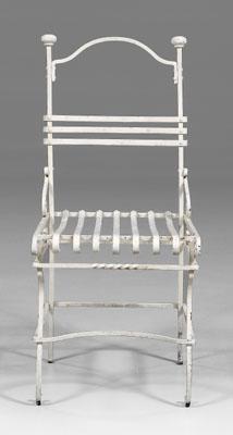 Appraisal: Painted wrought iron garden chair twisted and scrolled decoration white-painted