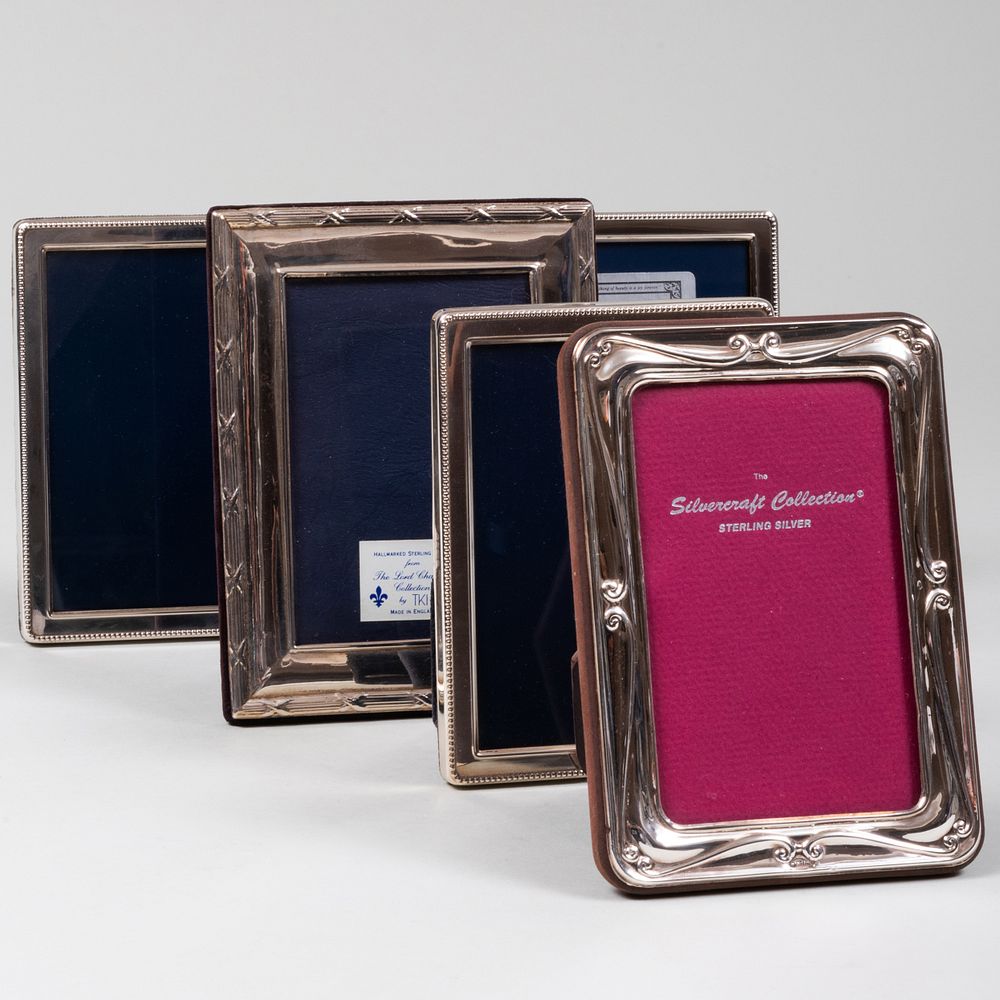 Appraisal: Group of Four English Silver-Mounted Picture Frames and an American