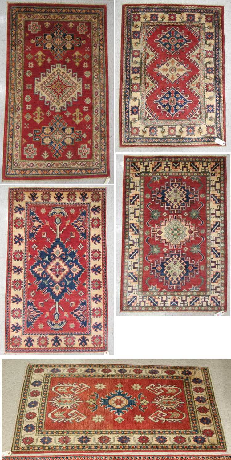 Appraisal: FIVE HAND KNOTTED ORIENTAL AREA RUGS Pakistani Caucasians geometric patterns