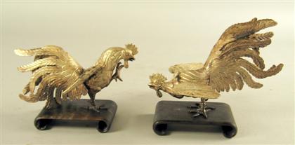 Appraisal: Pair of Chinese silver figures of fighting cockerelsEach in a