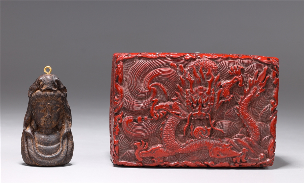 Appraisal: Chinese carved wood Guanyin pendant in red lacquer like box