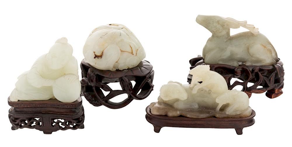 Appraisal: FOUR CHINESE WHITE JADE FIGURES ON STANDS LATE QING DYNASTY