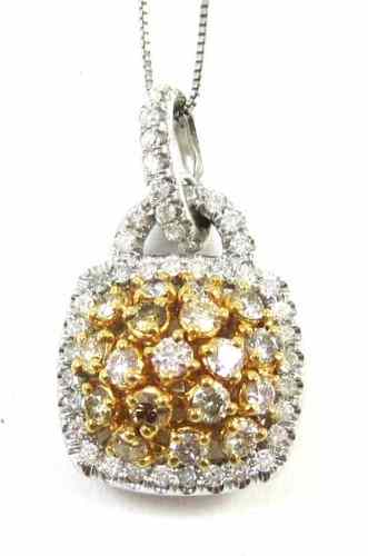 Appraisal: DIAMOND AND FOURTEEN KARAT GOLD PENDANT NECKLACE The pendant is