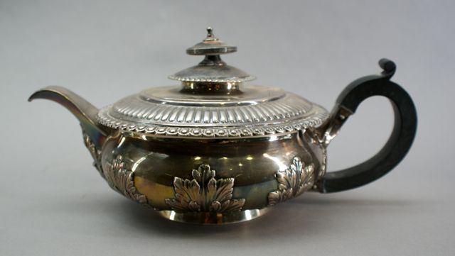 Appraisal: A George III sterling silver teapot Maker HS London of