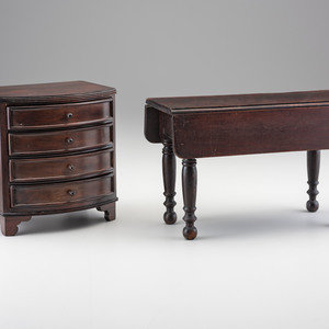 Appraisal: A Miniature Bow Front Chest of Drawers and Drop-Leaf Dining