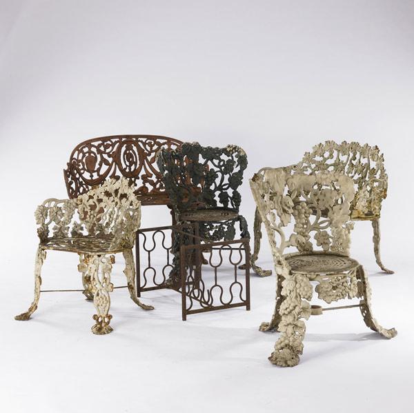 Appraisal: GARDEN FURNITURE Six wrought iron pieces with foliate designs include