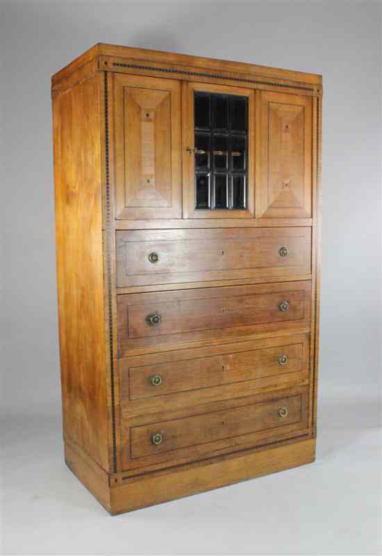 Appraisal: An Austrian Art Deco inlaid oak cabinet with two doors