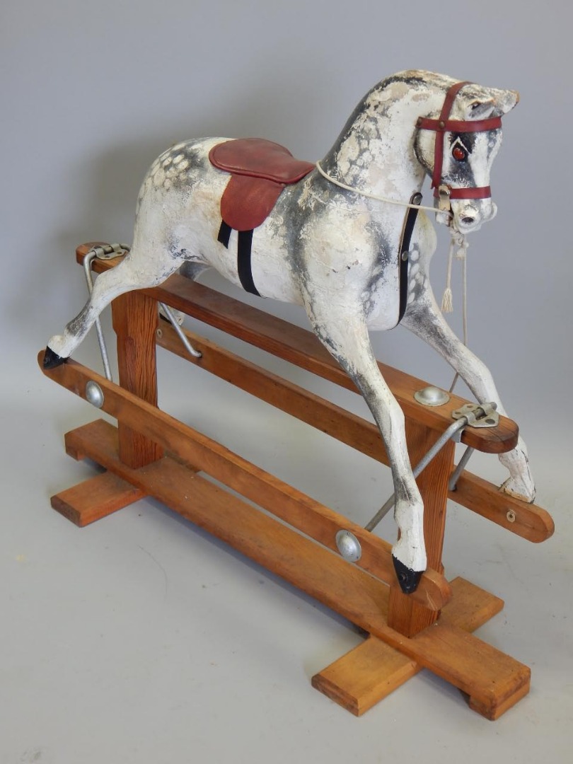 Appraisal: A thC and later rocking horse the horse itself painted