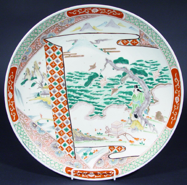 Appraisal: Oriental porcelain charger painted and gilded with figures flowers and