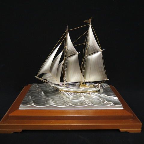 Appraisal: Sterling Silver Sailboat Model by Takehiko Japan gold highlights in