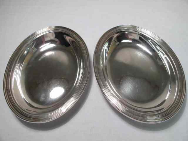 Appraisal: Two sterling silver oval bowls with reeded rims Each measuring