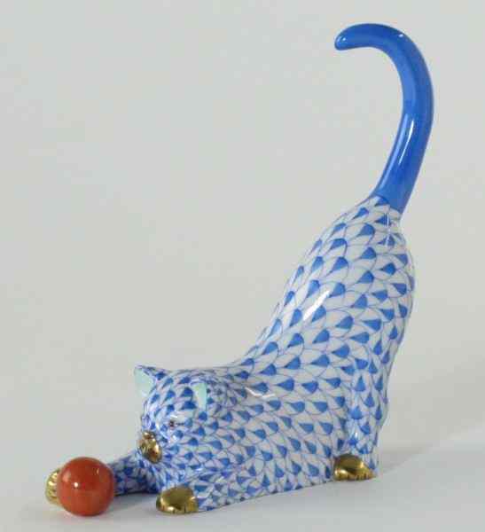 Appraisal: Herend Cat ''Playing Ball''hand painted blue fishnet motif with red