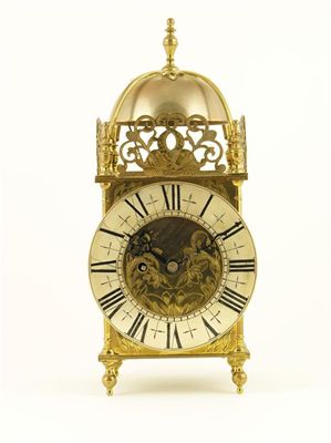 Appraisal: A brass lantern clock the single fusee striking movement to