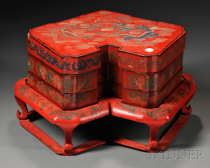 Appraisal: Lacquer Food Box China triangular three stacked boxes with smaller