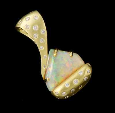 Appraisal: An Australian Opal Gold and Diamond Slider Pendant k yellow