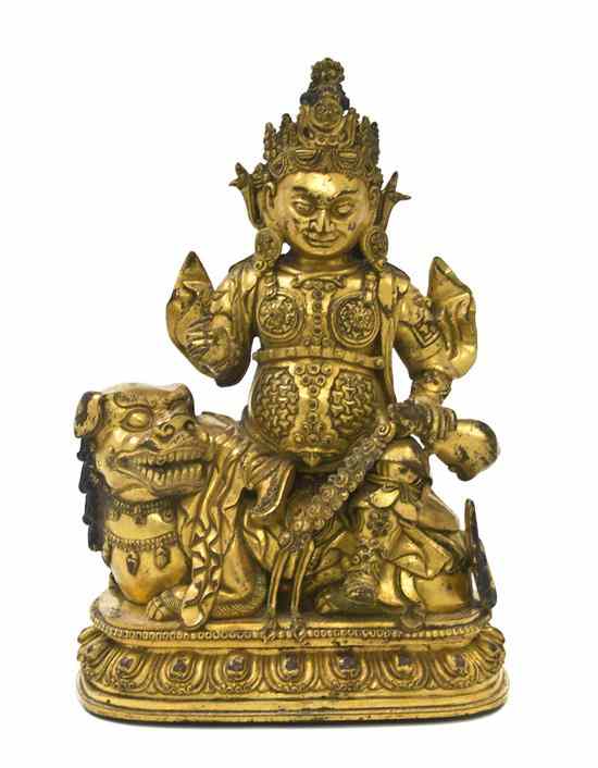 Appraisal: A Chinese Gilt Bronze Figure in the Ming style depicting