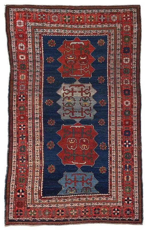 Appraisal: Trans-Caucasian Rug early th century blue field with four medallions