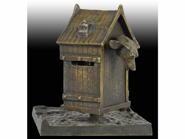 Appraisal: Brass European Building with Dog Head Still Bank Description Dog's