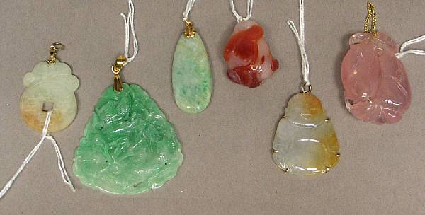 Appraisal: A group of six jadeite and hardstone pendants Four of