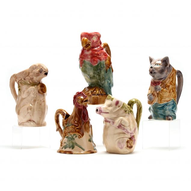 Appraisal: FIVE FIGURAL MAJOLICA PITCHERS Late th century the first a