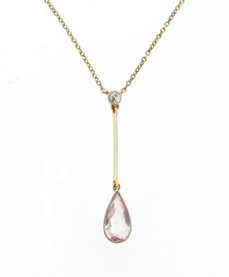 Appraisal: An Edwardian pink topaz and diamond pendant On a fine