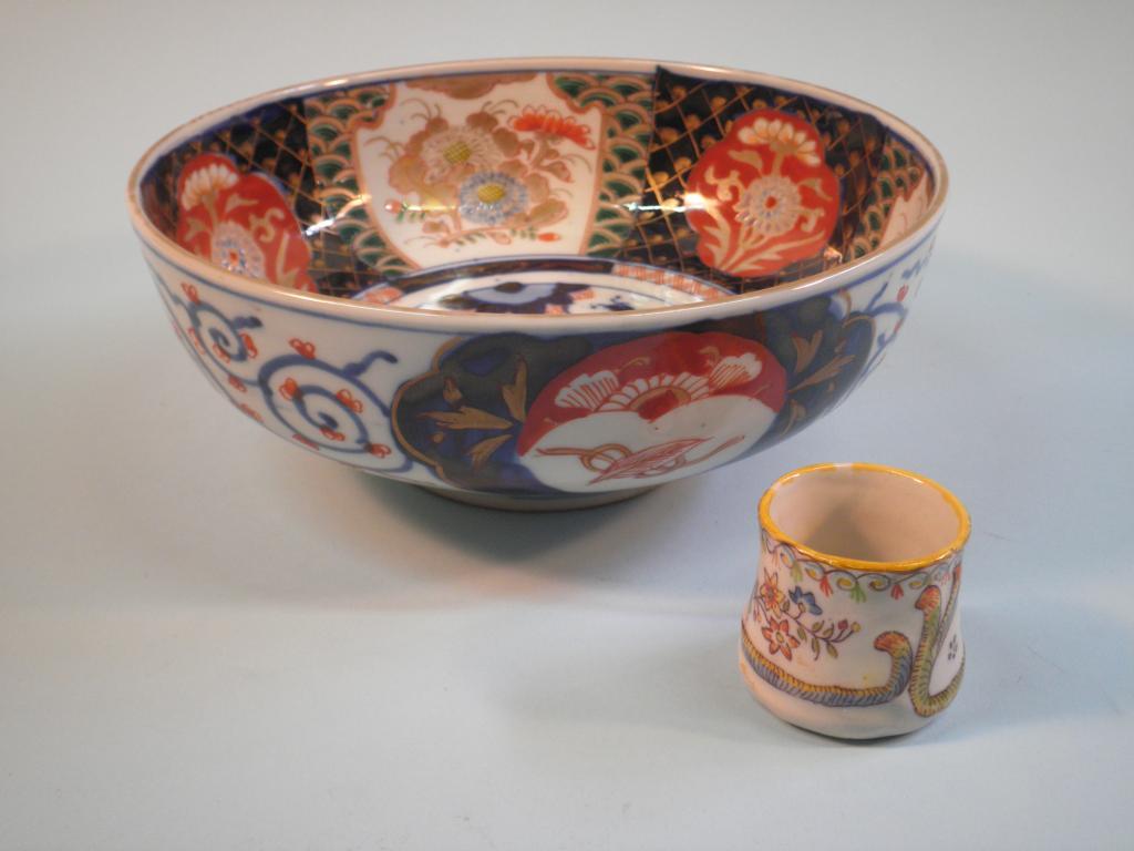 Appraisal: A Japanese Imari bowl decorated with flowers and scrolls cm