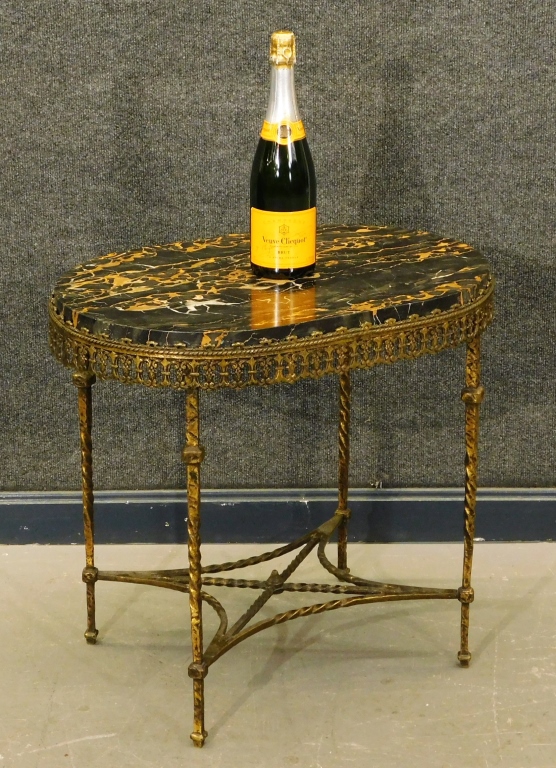 Appraisal: ATTRIB OSCAR BACH WROUGHT IRON MARBLE TOP TABLE United States