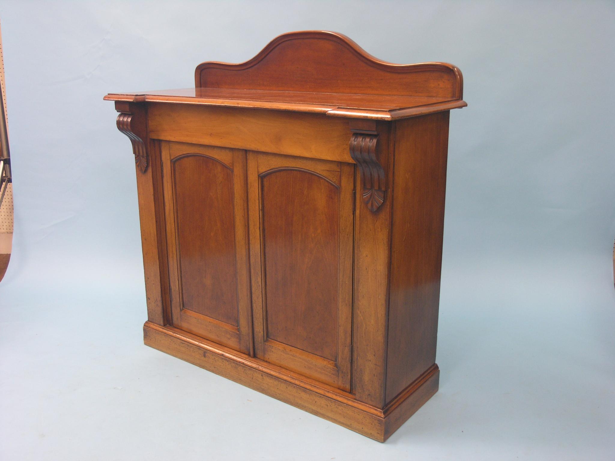 Appraisal: A Victorian mahogany chiffonier single frieze drawer above pair of