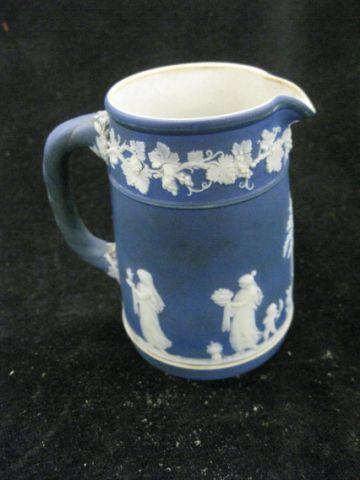 Appraisal: Wedgwood Dark Blue Jasperware Creamer classical scenes excellent