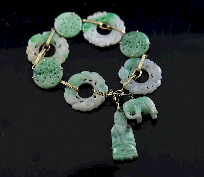 Appraisal: K Chinese Carved Jade Bi Discs Stamped k yellow gold