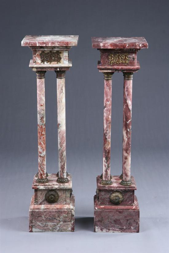 Appraisal: PAIR FOUR-COLUMN MARBLE PEDESTALS early th century Square swivel top