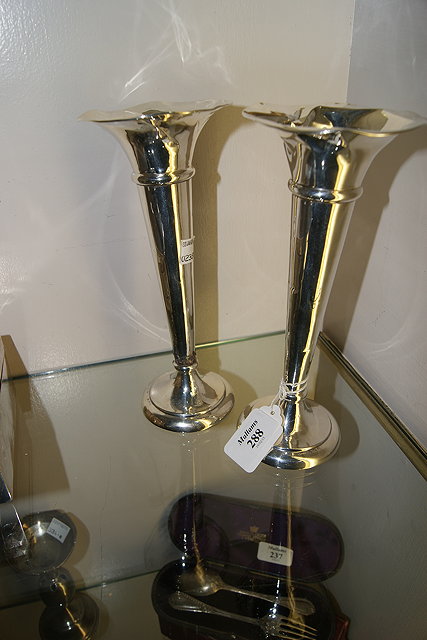 Appraisal: A PAIR OF SILVER ROSE VASES of tapering cylindrical form