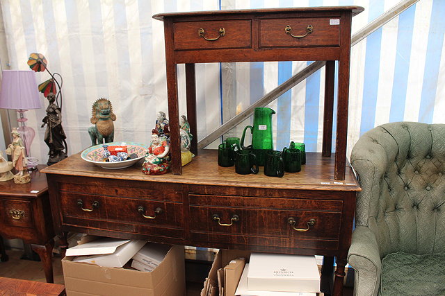 Appraisal: AN OAK DRESSER BASE with two drawers brass swan neck