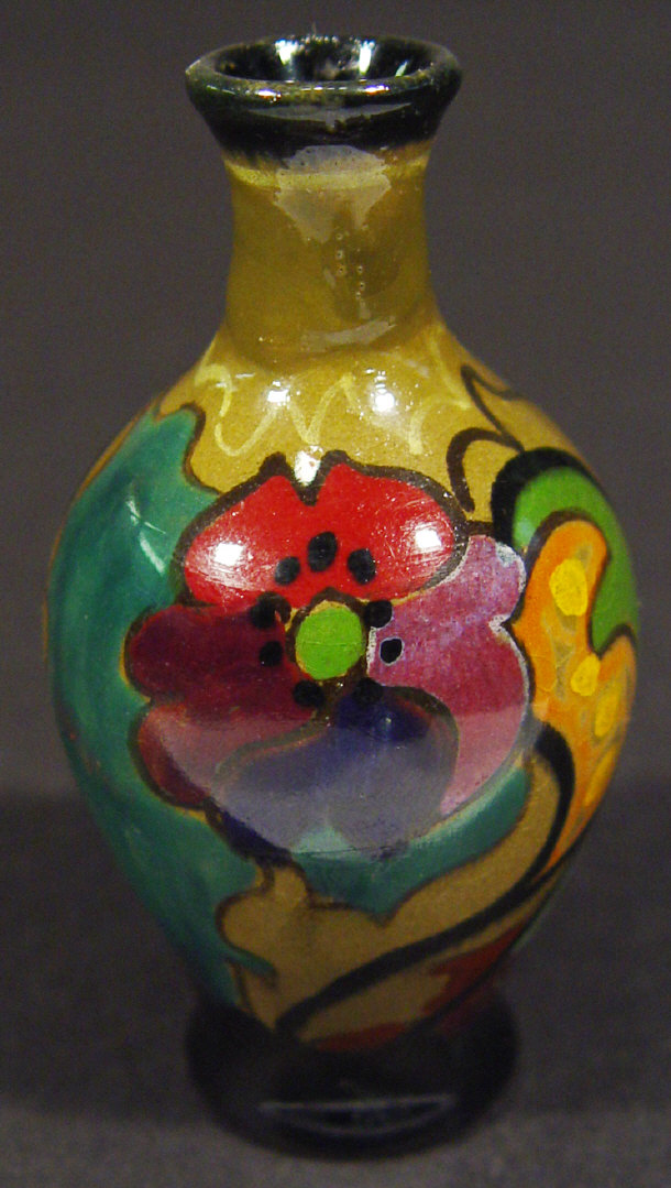 Appraisal: Miniature Gouda vase hand painted with Art Nouveau style flowers