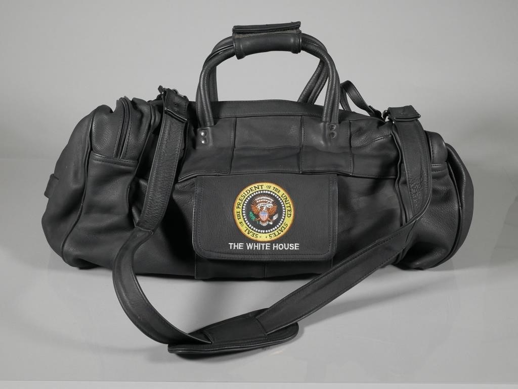 Appraisal: White House staff black leather duffel or travel bag with