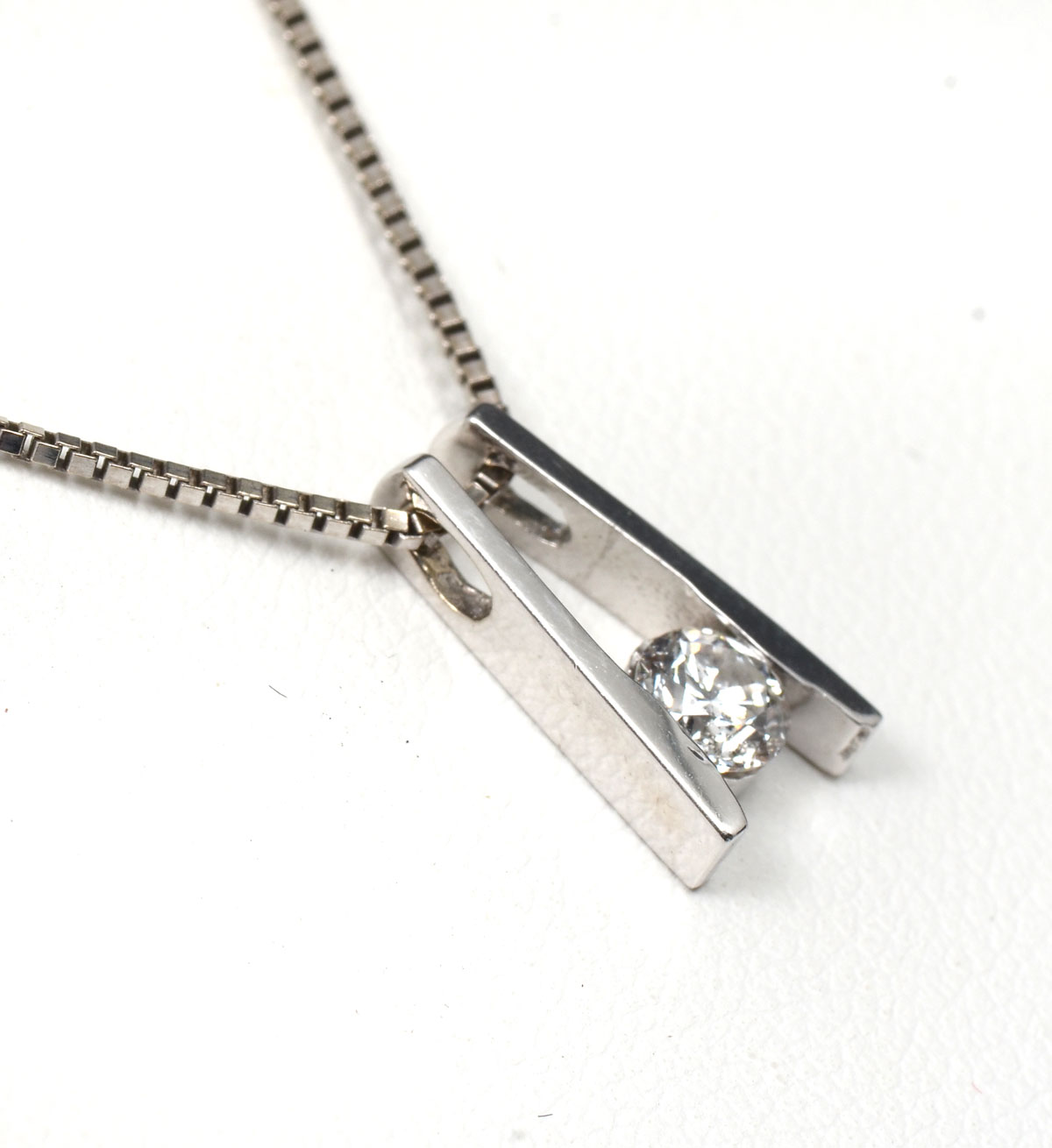 Appraisal: K DIAMOND PENDANT CHAIN K white gold pendant contains round