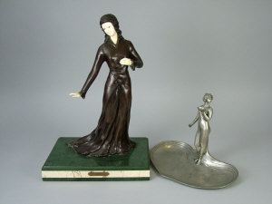 Appraisal: A bronze figure of a lady after Lorenzl lady dressed