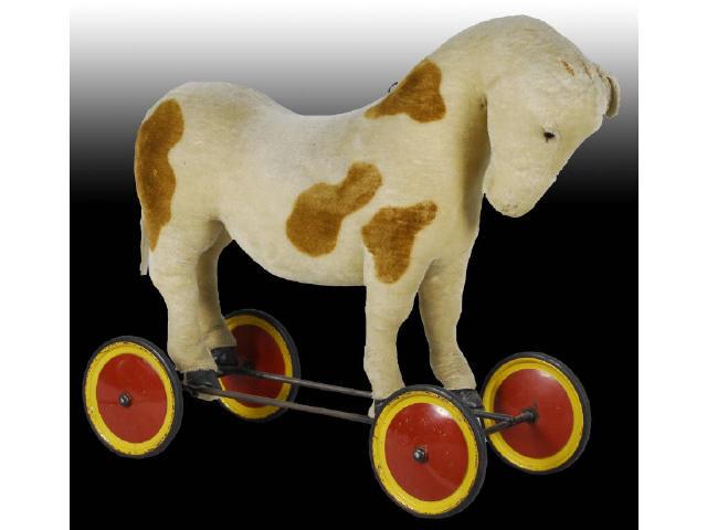 Appraisal: Large Steiff Horse Pull Toy on Wheels Description Mohair horse