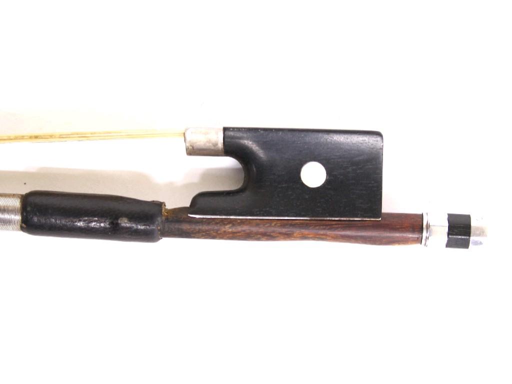 Appraisal: Silver mounted violin bow unstamped the stick round the ebony