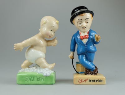 Appraisal: Royal Doulton advertising figures The Fairy Baby MCL and Sir