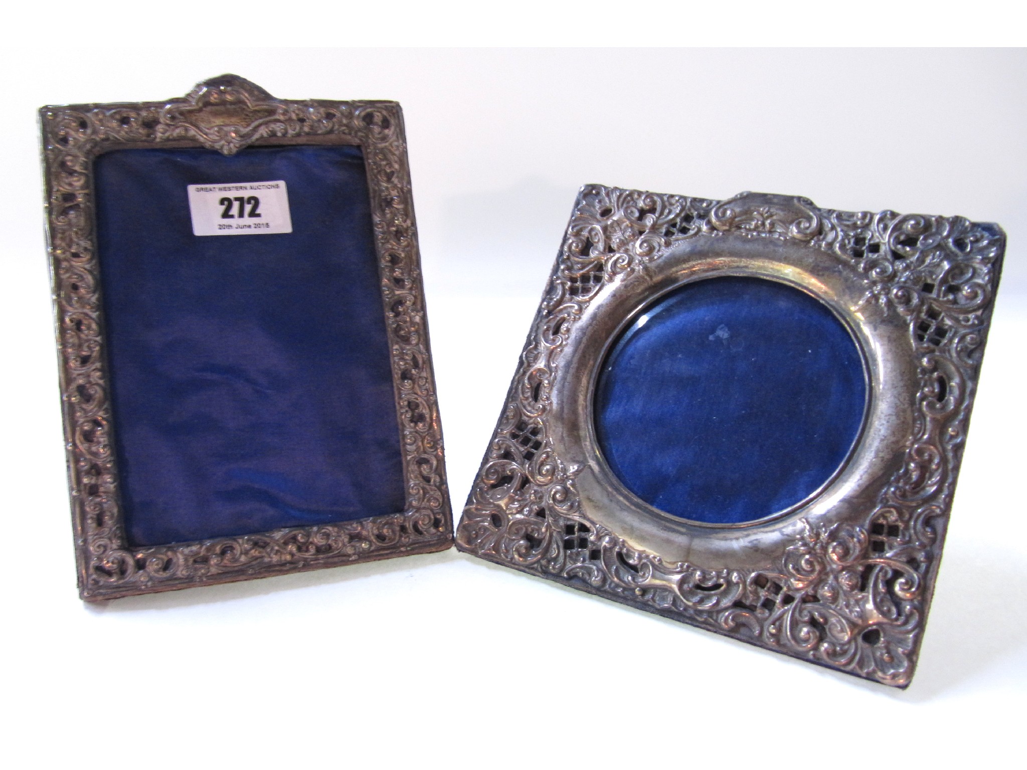 Appraisal: A lot comprising two white metal mounted photo frames unmarked