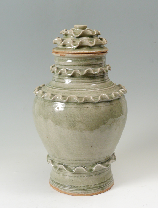 Appraisal: CHINESE CELADON COVERED JAR Large covered jar with applied ruffle