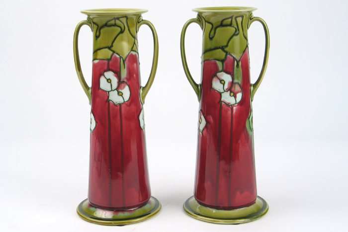 Appraisal: PAIR OF MINTON ART DECO PORCELAIN VASES in the manner