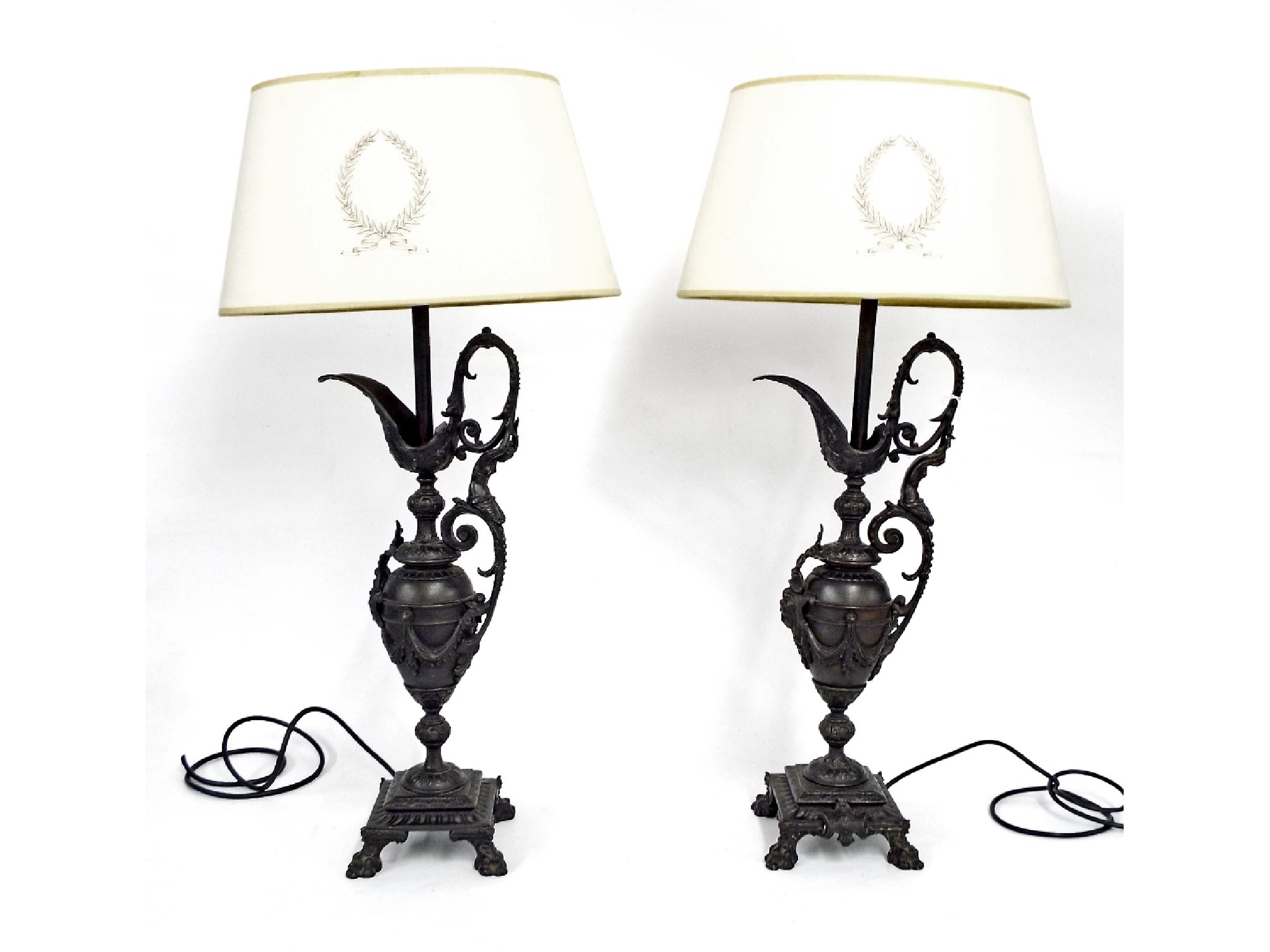 Appraisal: Pair of bronzed spelter table lamps in the form of