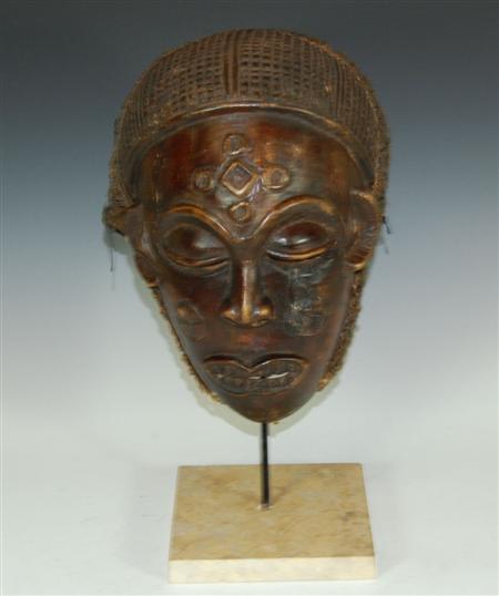 Appraisal: Ethnographic Interest A carved wood mask probably Tchokwe Congo woven