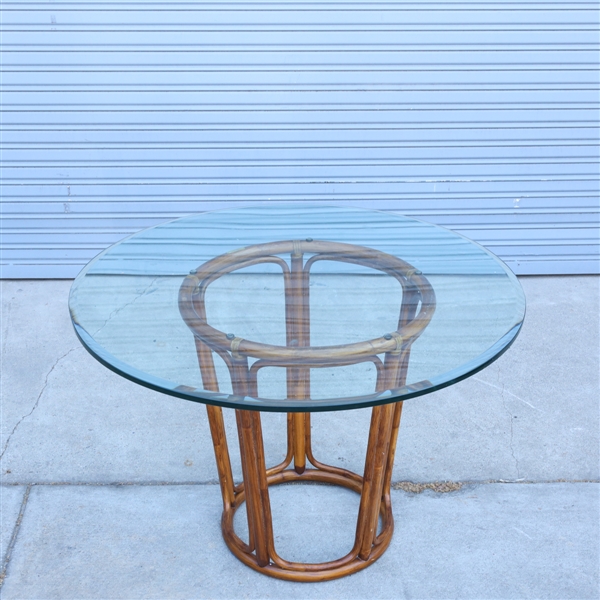 Appraisal: Table by McGuire with plaque beveled glass circle top bamboo