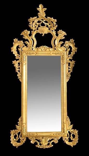 Appraisal: An Italian Rococo style carved and giltwood pier mirror th