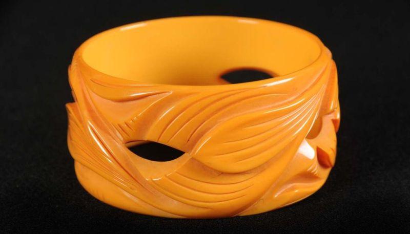 Appraisal: Bakelite Abstract Floral Reticulated Bracelet Description Deeply carved Condition Near