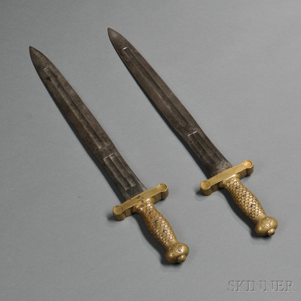 Appraisal: Two Model Foot Artillery Swords c brass hilt and grip