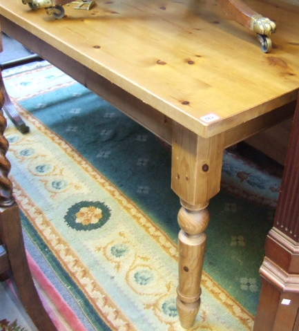 Appraisal: A modern pine rectangular dining table and six scullery type